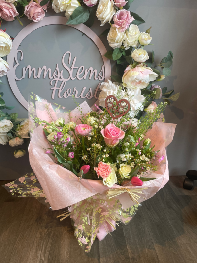 Always there - These beautiful flowers in soft shades are seasonal flowers chosen by the florist and presented in lovely gift wrap.