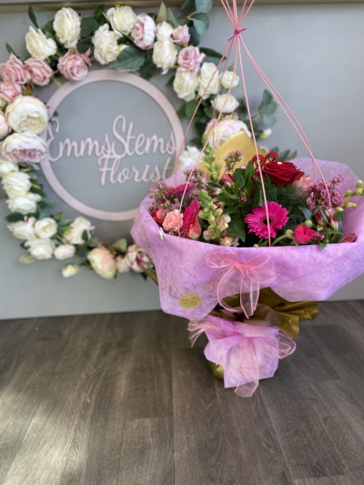 Stunning Mix Bouquet - Beautiful mix of rich reds and cerise pink flowers  and lovely Foliage finished in a luxury Gift Wrap.