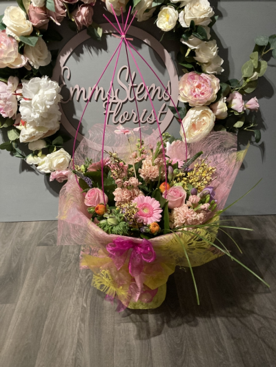 Spring Twist - Beautiful Spring Flowers arranged and luxury gift wrapped in water as an aqua packed bouquet. Finished with a modern twist