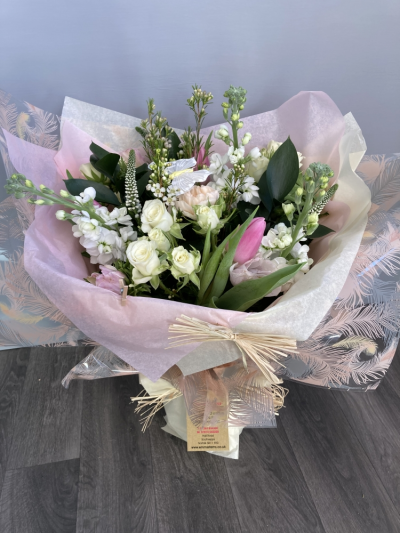 Softy Softy - A beautiful presented Bouquet in water including Pink and Cream seasonal Flowers