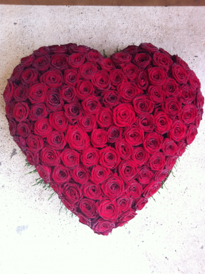 Luxury Red Rose Heart - This beautiful Tribute is based in scented Red Roses. Large design. 18"