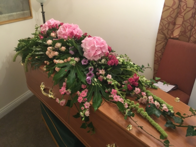 Pink Coffin Spray - Bespoke Full Coffin Spray made on the Coffin of your Loved One. Whatever Colours, Flowers, Shape you have in mind, we will make it for you.