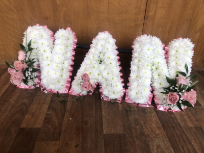 Pink Nan Letters - NAN Letters designed with a Pink Ribbon Edge, White Flower Base and beautiful Pink Rose Sprays