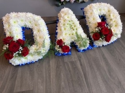 Red and Blue DAD Letters - DAD Letters, with a Blue Ribbon edge, White base flowers and beautiful Red Roses in sprays on each letters.