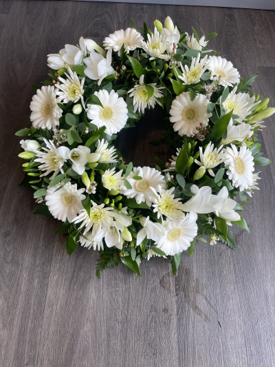 White Wreath - A classic design in all white seasonal flowers