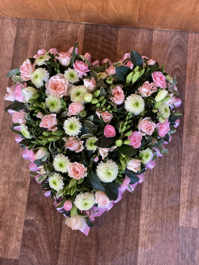 Heart - Heart with pale pink & white flowers with a pink ribbon edge.
Standard- 12"
Medium-15"
Large-18"
