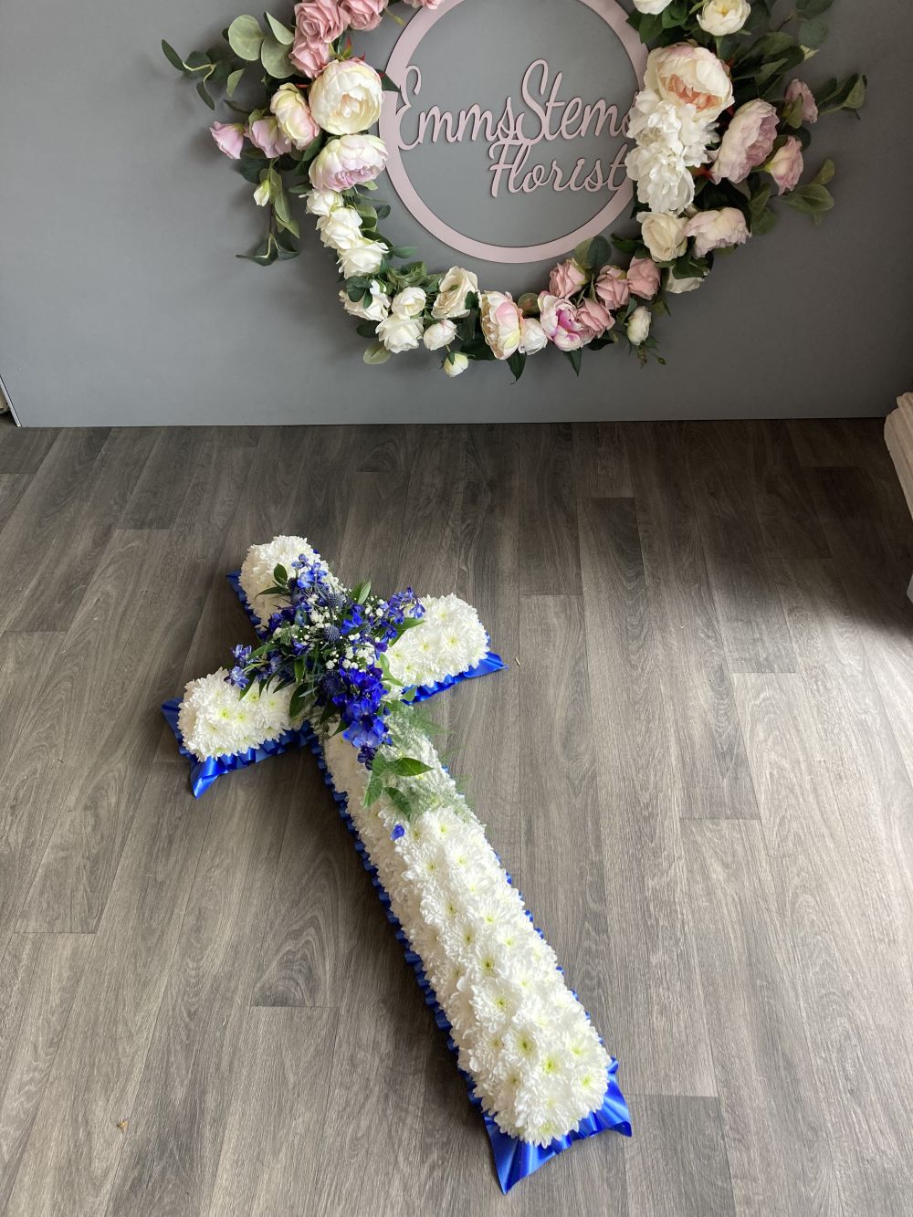 White Massed Cross with Blue Spray