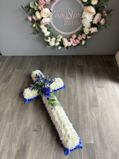 White Massed Cross with Blue Spray - White Massed Cross with Blue Ribbon & Flower Spray
