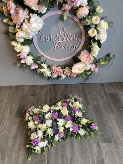 Open Based Pillow in Lilac & White - A soft and serene tribute with lilac carnations, white roses, and gentle greenery, offering comfort and grace during a difficult time.