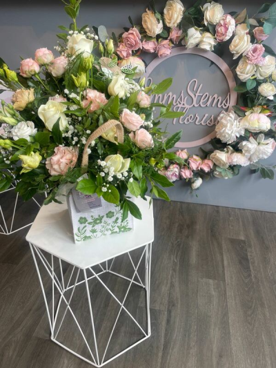 Pretty Bag - Beautiful soft coloured flowers arranged in a detailed hessian bag