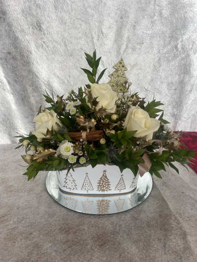 Festive Tree - Festive Tree Arrangement including white Roses arranged in a container. This can be placed in the centre of a table.