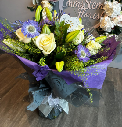 Lilac Kisses - Experience the enchanting allure of 'Lilac Kisses' from Emms Stems. A delightful blend of soft lilacs and creams, adding a touch of elegance to any occasion in Southrepps.